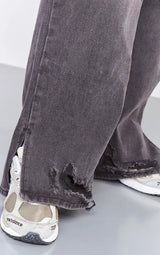 PrettyLittleThing Plus Ripped Split Hem Straight Leg Jeans - Washed Black