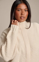 PrettyLittleThing Plus Cream Funnel Neck Concealed Placket Boucle Zip Up Jumper - Cream